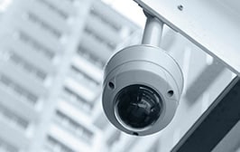 CCTV camera directed at a building.