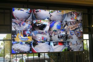 A wide screen showing different CCTV footages.