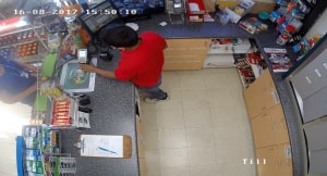 CCTV camera footage inside a grocery store.